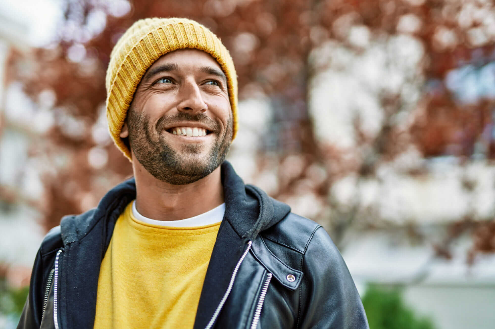 happy man with yellow hat Mile High Psychology Example of man showing the positive results of individual therapy for personal growth