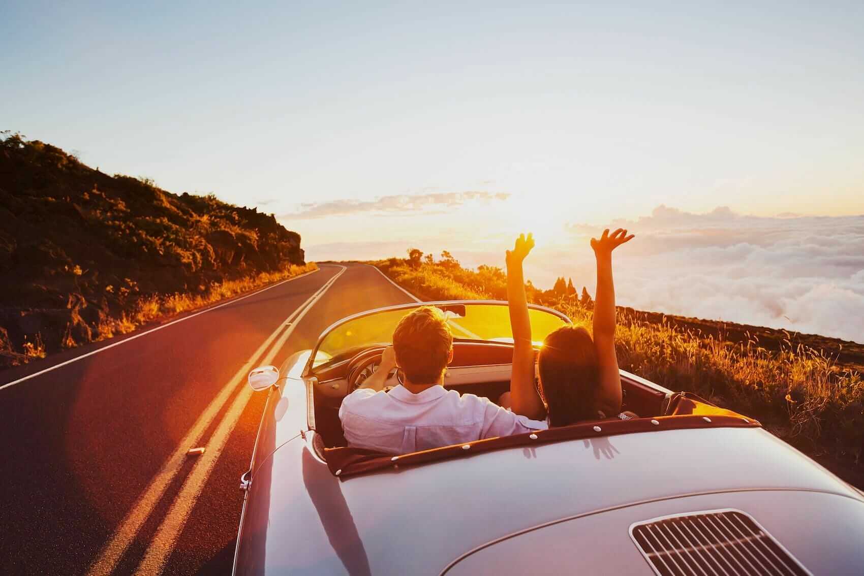 Happy,Couple,Driving,Into,The,Sunset Mile High Psychology Cultivating joy through couples counseling