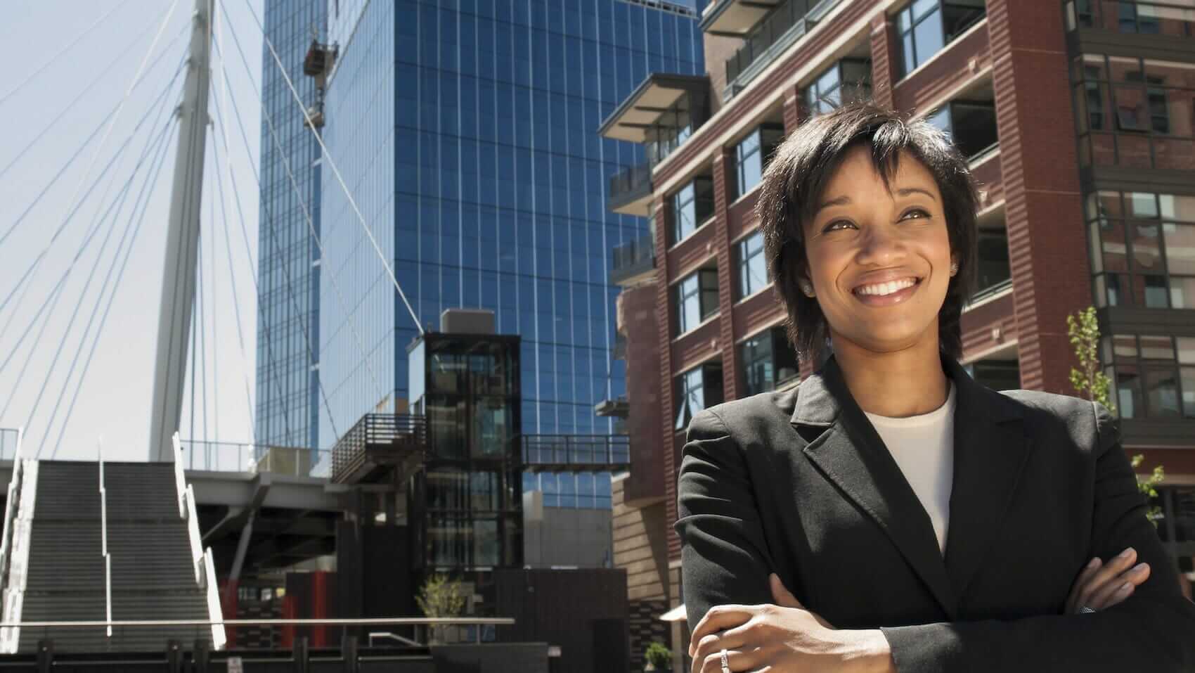 Portrait professional business woman in Denver Mile High Psychology Example of career satisfaction found by working with our Denver psychologist