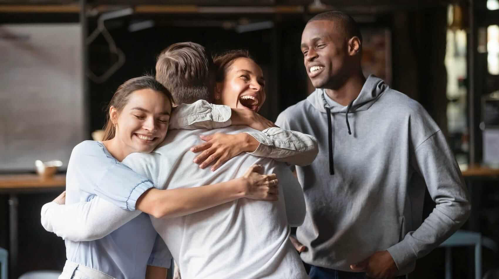 Happy reunion among friends Mile High Psychology example of mental health assessment contributes to recovery and wellness