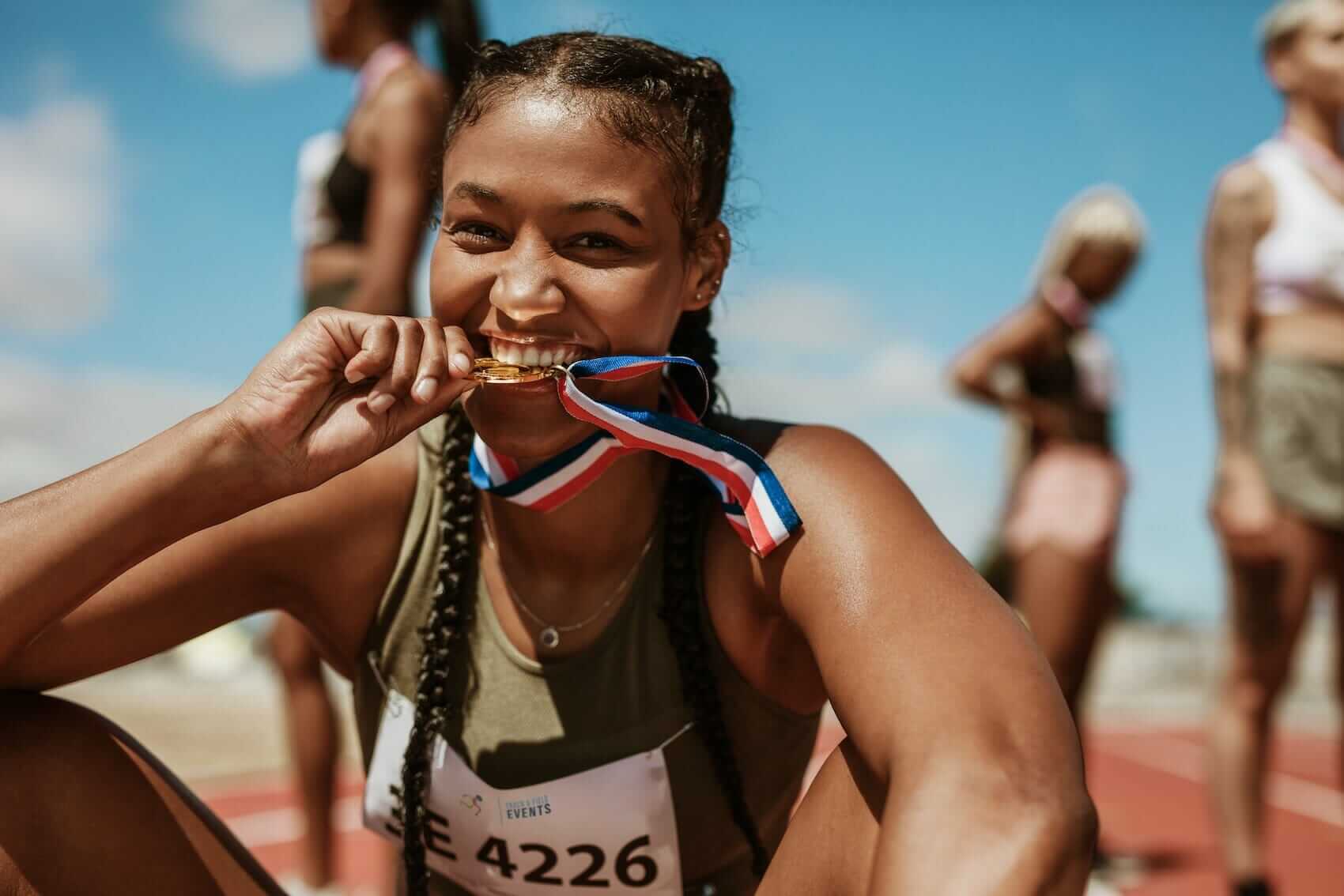 Woman Olympic Medalist Mile High Psychology Example of the results of US Olympic Training Center located in Colorado Springs