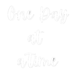 Handwritten phrase “One Day at a Time” in light gray script.